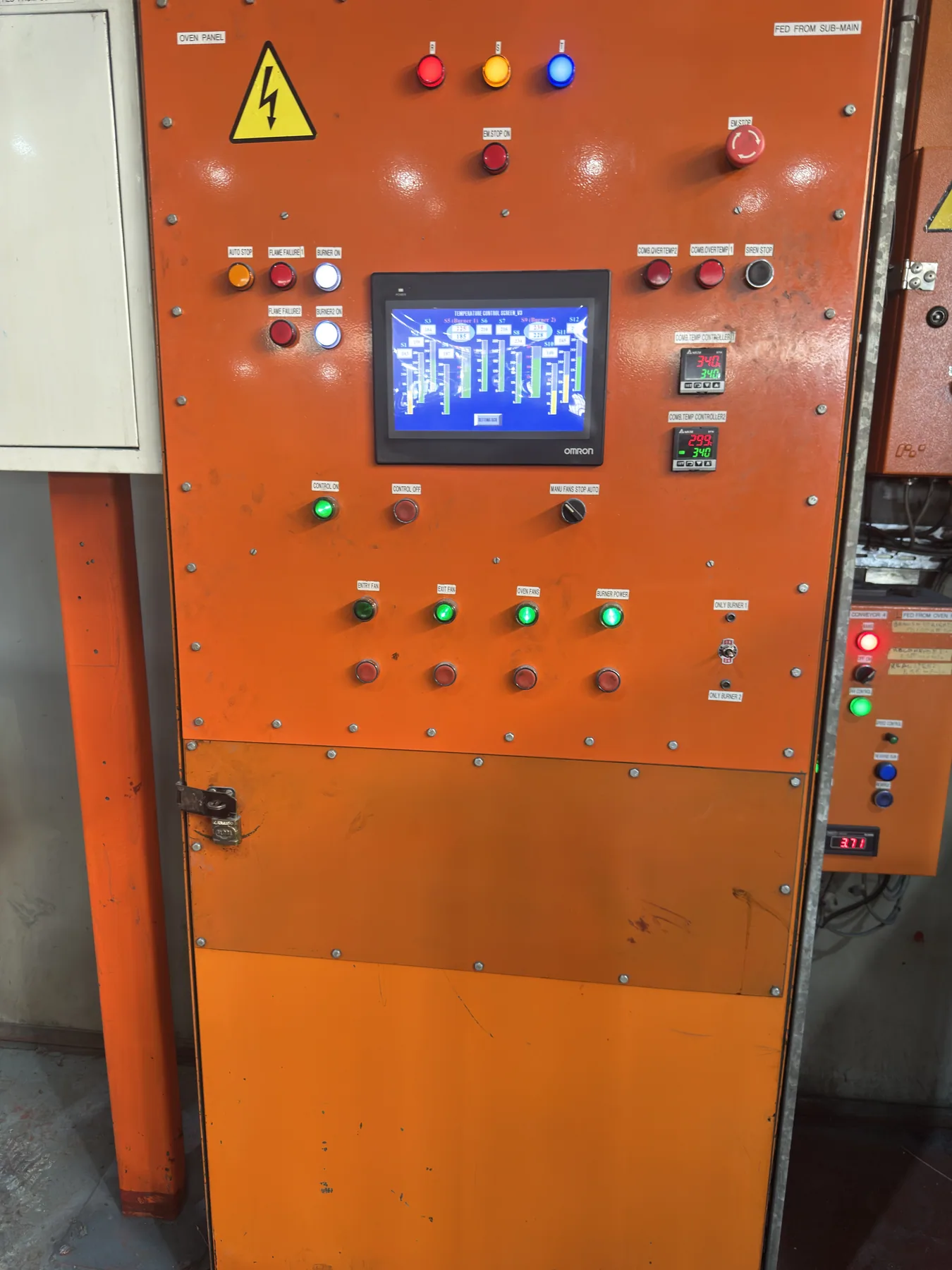 Industrial machine-control panel with HMI, status indication and operator controls